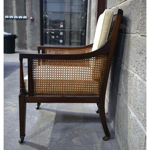 2868 - A Bergere chair with cushions  62 x 58 x 96 cm .