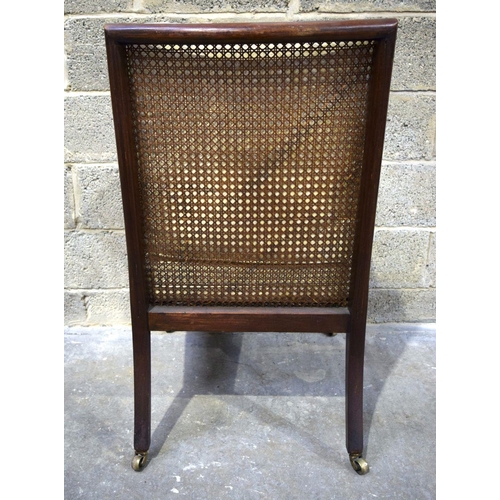 2868 - A Bergere chair with cushions  62 x 58 x 96 cm .