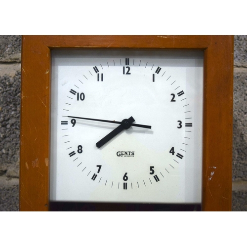 2874 - A wooden cased Gents Electric Pulsynetic master clock 129cm.