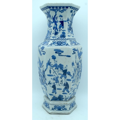 2884 - A Chinese Blue and white vase decorated with children 45 cm .