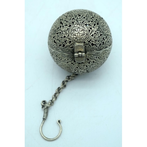 2906 - A Chinese white metal engraved openwork incense burner 5cm .