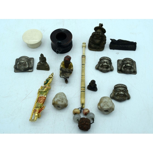 2925 - A collection of small Asian metallic items , Buddhas etc Qty.