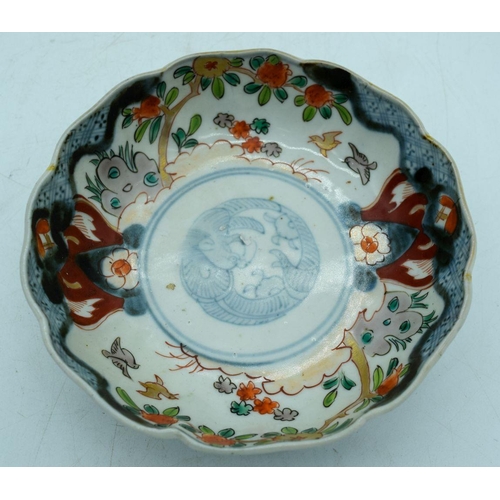 2944 - A Collection of Chinese porcelain items dishes, bowls , carved calligraphy block etc (7)