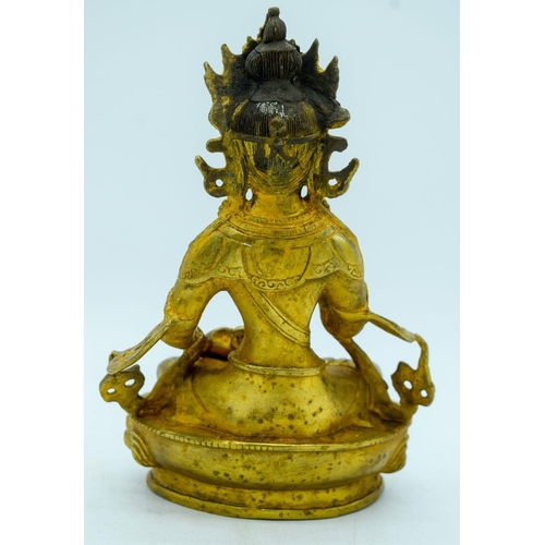 2949 - A Chinese Tibetan gilt bronze Buddha 20cm.