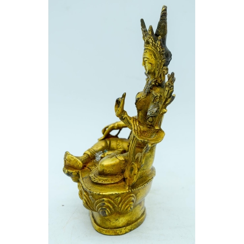 2956 - A Tibetan gilded bronze buddha 15cm .