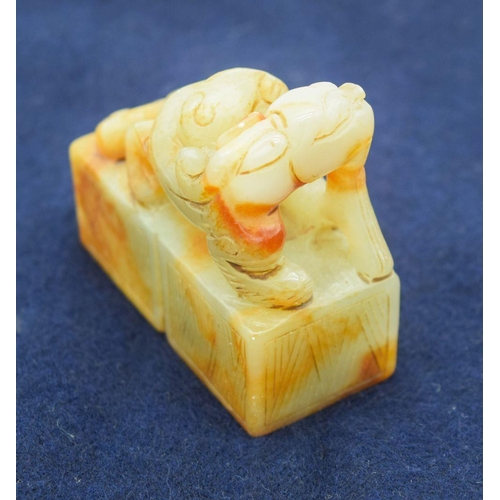 2965 - A Chinese jade seal carved with a dragon 6.5 x 6cm .