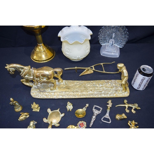 2967 - A collection of brass items including a horse and plough, oil lamp and a glass peacock etc. 46cm Qty