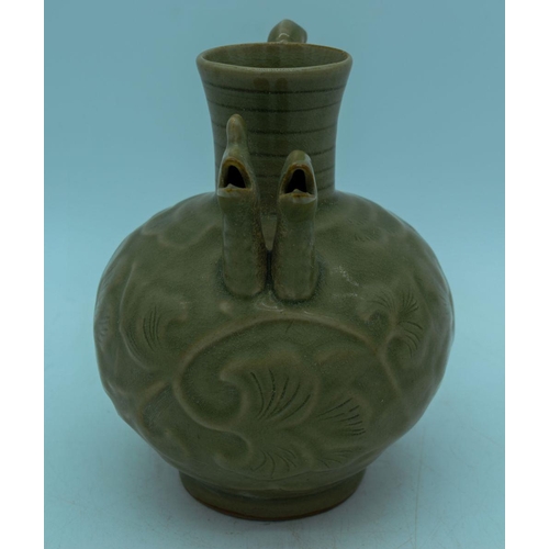 2986 - A Chinese Yaozhou celadon ware wine pot 15cm.