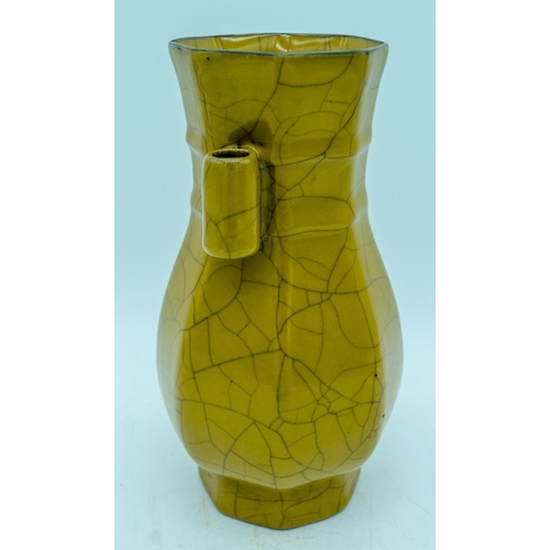 2988 - A Chinese Guan ware vase 23 cm.