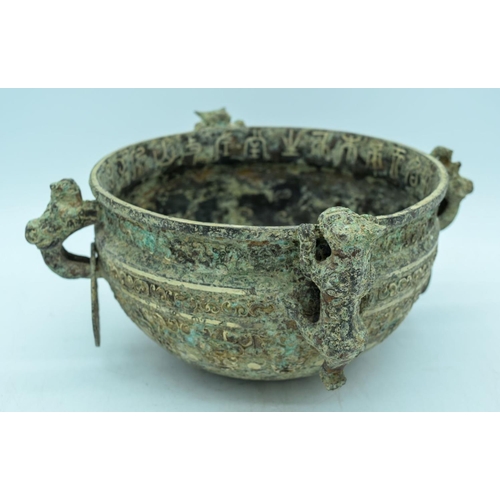 2990 - A Chinese bronze twin handled incense burner 27 x 11cm .