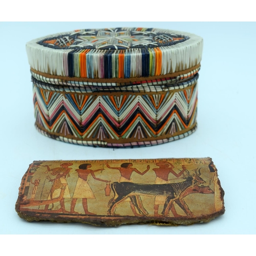 2920 - A small Egyptian terracotta painted plaque together with an American Quill decorated box 14 x 18 cm