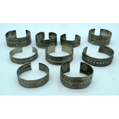 2921 - A collection of Bedouin white metal jewellery bracelets, pendants etc Qty.