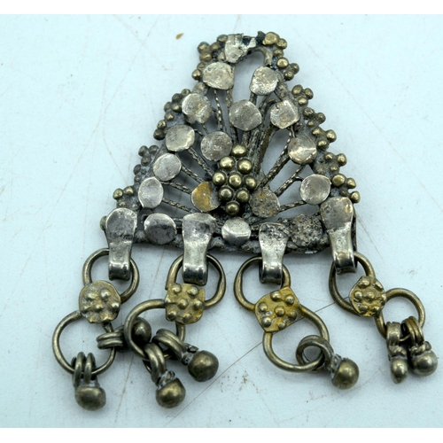 2921 - A collection of Bedouin white metal jewellery bracelets, pendants etc Qty.