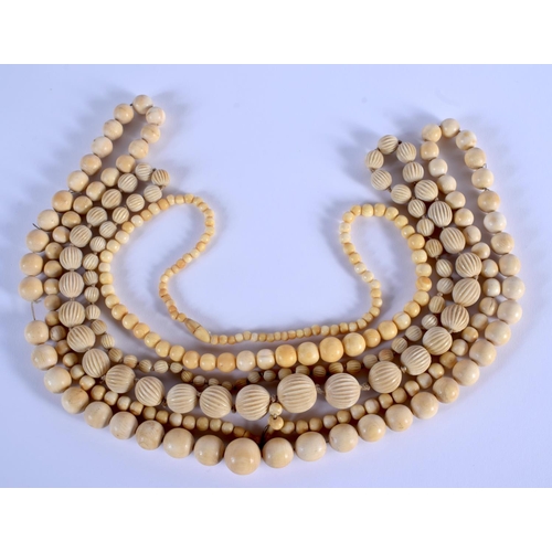 750 - THREE CONTINENTAL ANTIQUE IVORY NECKLACES. (3)