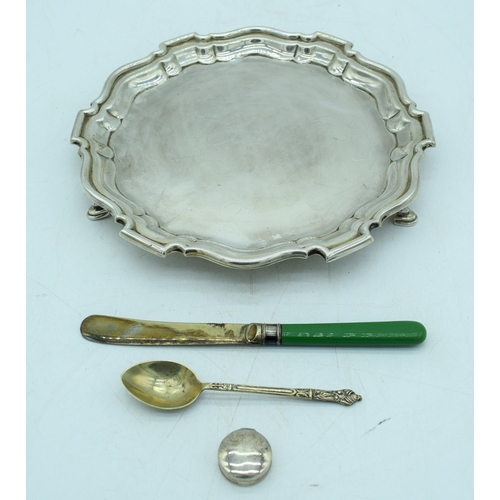 2940 - A silver salver together with a small silver pot and two plated items .Silver 220g (4).