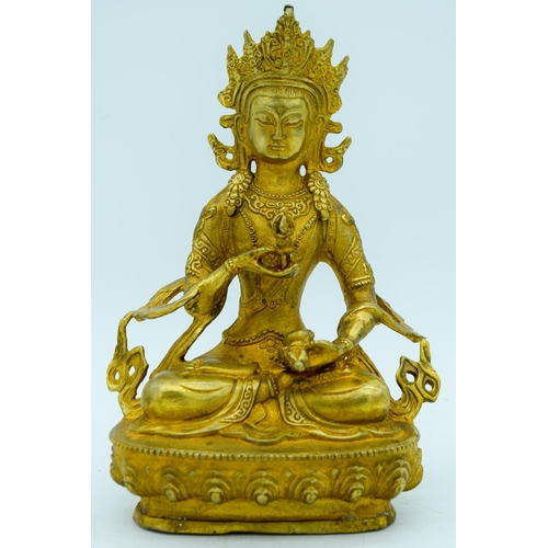 2949 - A Chinese Tibetan gilt bronze Buddha 20cm.