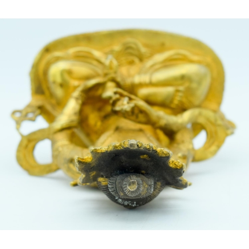 2949 - A Chinese Tibetan gilt bronze Buddha 20cm.