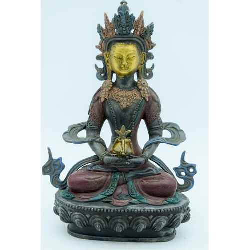 2950 - A Chinese Tibetan bronze Buddha 21cm.