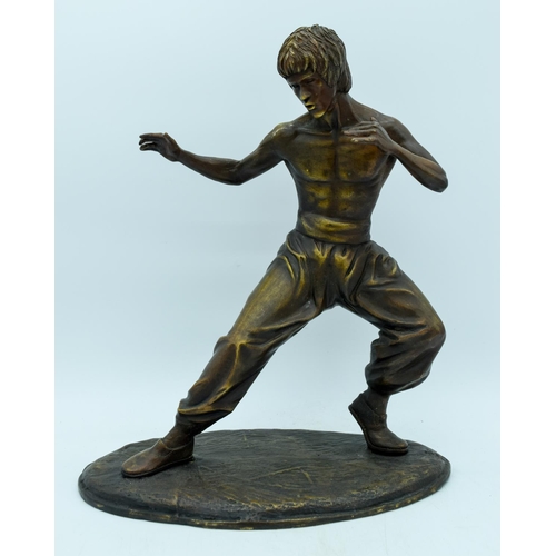 2953 - A bronze statue of Bruce Lee 35cm.