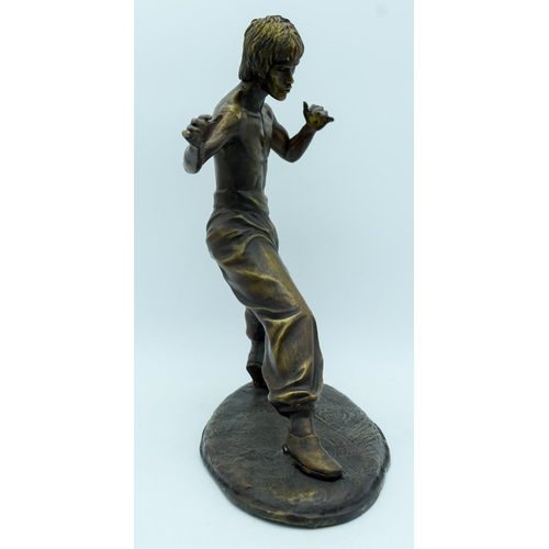 2953 - A bronze statue of Bruce Lee 35cm.