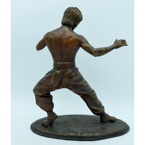 2953 - A bronze statue of Bruce Lee 35cm.