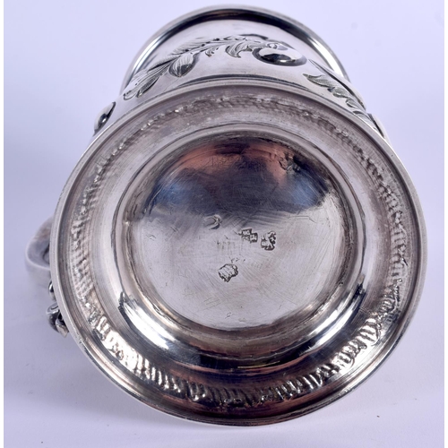 784 - AN ANTIQUE SILVER MUG decorated with foliage. London 1828. 339 grams. 13 cm high.