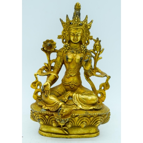 2956 - A Tibetan gilded bronze buddha 15cm .