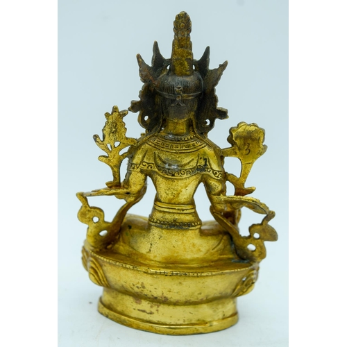 2956 - A Tibetan gilded bronze buddha 15cm .