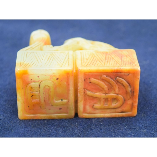 2965 - A Chinese jade seal carved with a dragon 6.5 x 6cm .