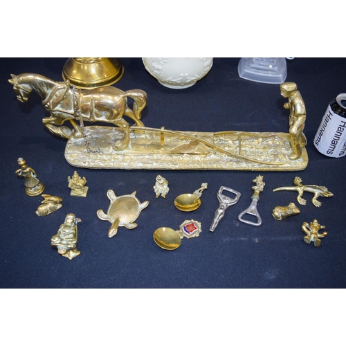 2967 - A collection of brass items including a horse and plough, oil lamp and a glass peacock etc. 46cm Qty