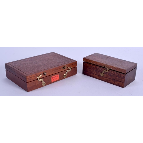 815 - TWO LOVELY ANTIQUE MINIATURE TREEN BOXES containing miniature artefacts, including a magnifying glas... 