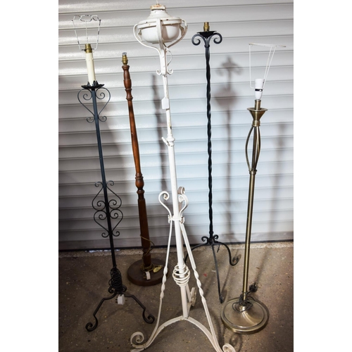 2979 - A collection large metal and wooden lamp stands  160cm (5) .