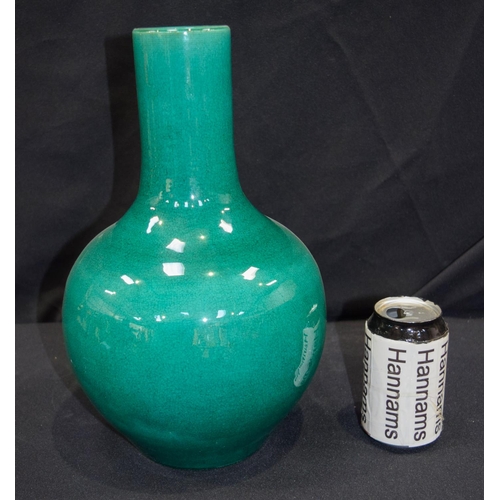 2980 - A Chinese green glaze vase 33 cm.