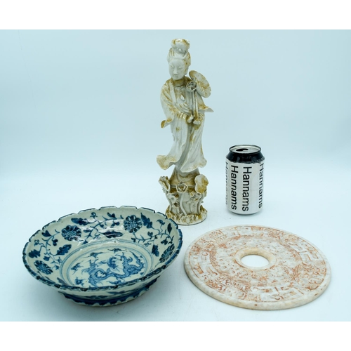 2984 - A Chinese Blue and white dragon bowl , a Bi disc  cm  and a blanc de chine figure of a woman.