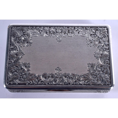 877 - A 1940 SILVER SNUFF BOX decorated with repousse foliage. 139 grams. 8.5 cm x 5.5 cm.