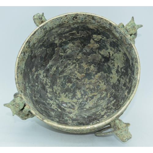 2990 - A Chinese bronze twin handled incense burner 27 x 11cm .