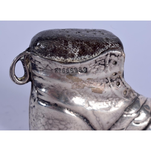 886 - AN ANTIQUE SILVER BOOT PIN CUSHION. 34 grams. 7.5 cm x 5 cm.