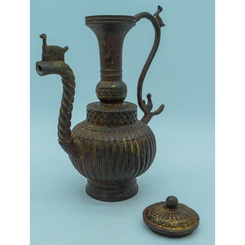 3003 - An Islamic  metal water jug 23 cm.