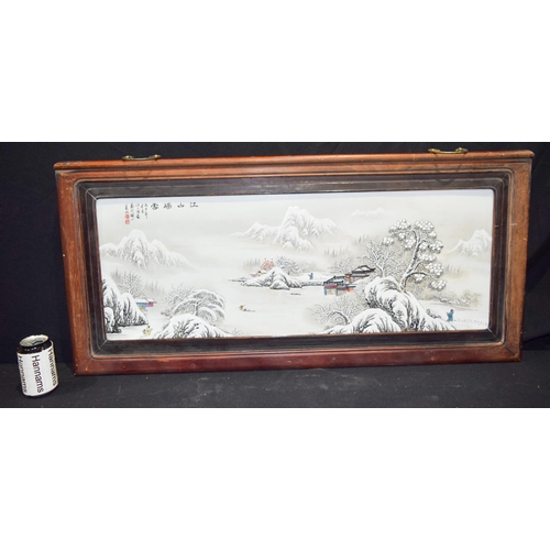 3006 - A Framed Chinese porcelain panel decorated with a snowy landscape 102 x 48 cm.