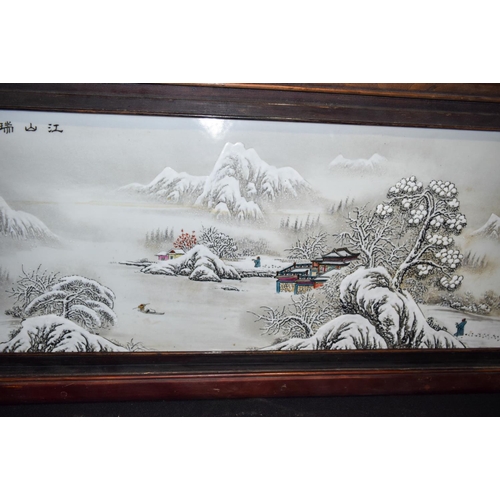 3006 - A Framed Chinese porcelain panel decorated with a snowy landscape 102 x 48 cm.