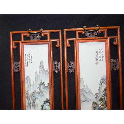 3008 - A framed pair of Famille Verte porcelain panels decorated with a landscape 68 x 28 cm (2)