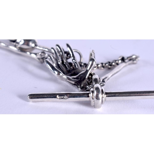 912 - A SILVER SKULL ON CHAIN. 60 grams. 30 cm long.