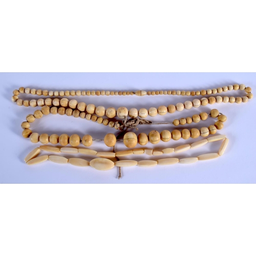 753 - THREE CONTINENTAL ANTIQUE IVORY NECKLACES. (3)