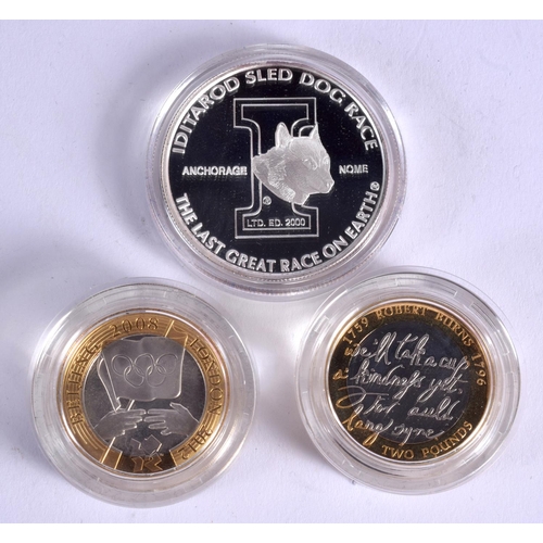 927 - THREE BOXED SILVER PROOF COINS. (3)