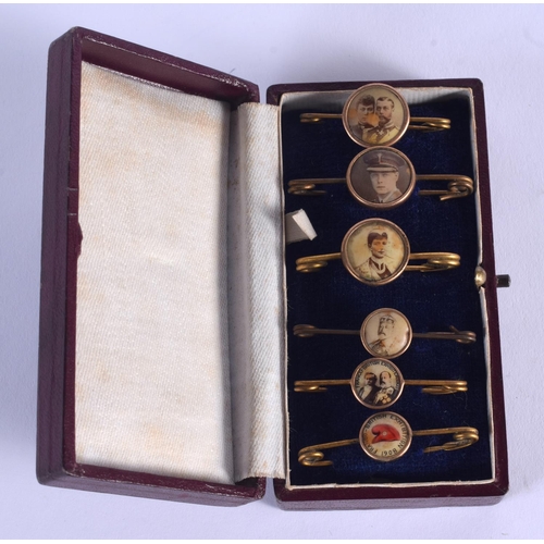 772 - SIX CASED ANTIQUE ENAMELLED PIN BADGES including the Franco British Exhibition 1908. (6)