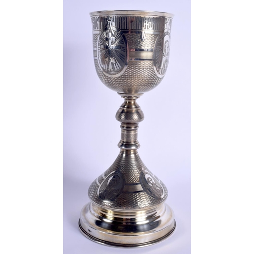 778 - A RARE LARGE 19TH CENTURY RUSSIAN SILVER CHALICE engraved with portraits of saints. 560 grams. 28 cm... 