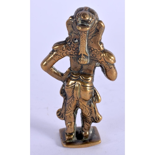 955 - AN 18TH/19TH CENTURY INDIAN BRONZE FIGURE OF A BUDDHISTIC DEITY. 8 cm high.