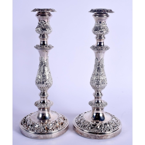 786 - A LARGE PAIR OF ENGLISH SILVER CANDLESTICKS. Birmingham 1948. 2312 grams weighted. 32.5 cm high.