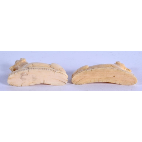 965 - A VERY RARE PAIR OF LATE 18TH CENTURY MUGHAL CARVED IVORY DOGS C1790 modelled upon shaped bases. 5 c... 