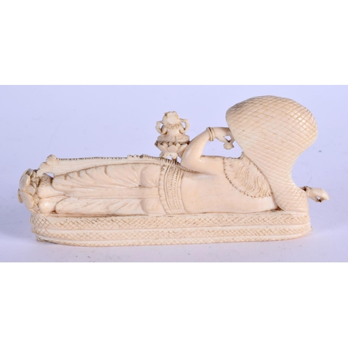 970 - A 19TH CENTURY ANGLO INDIAN CARVED IVORY BUDDHISTIC DEITY. 12 cm x 5 cm.